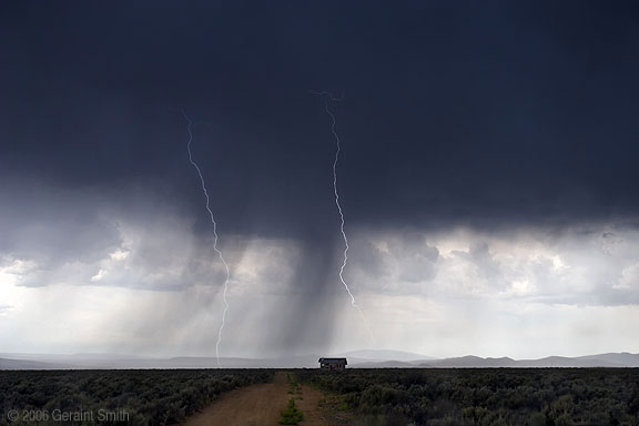 Lightning strikes and walking rain on the mesa in Taos, NM