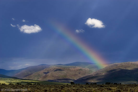 Taos Mountain, rainbow and sunset which followed last night