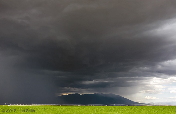 Driving south to Taos from the Great Sand Dunes National Park and Preservethrough the San Luis valley with Blanca Peak emerging from the storm