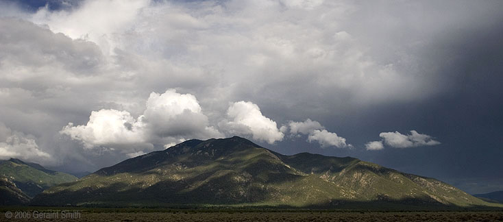 Taos Mountain last night and here's the rainbow and sunset which followed