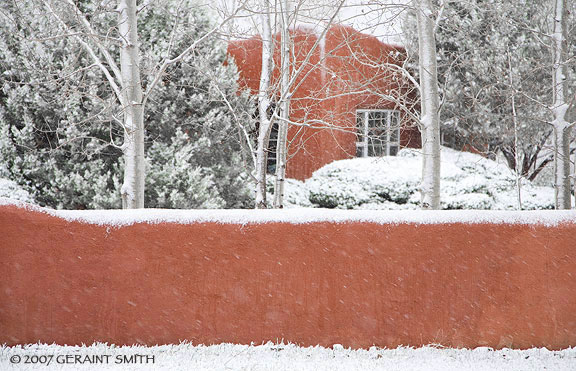 Pink adobe in the spring snowfall yesterday in Taos