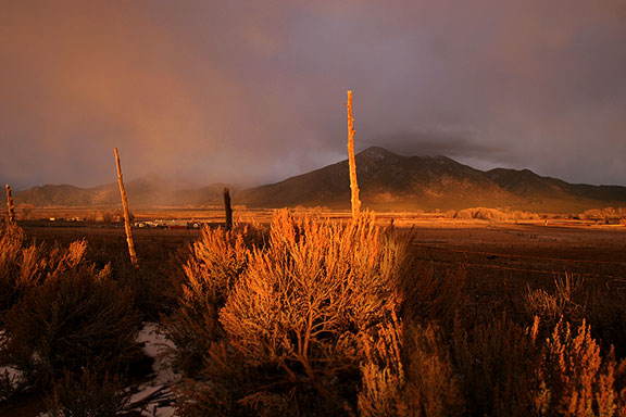 Mesa and mountain light from last night's sunset on Taos mountain, New Mexico