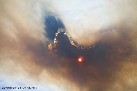 A fire burning west of Taos and the Rio Grande Gorge yesterday in New Mexico