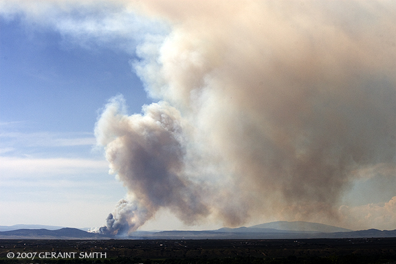 A fire burning west of Taos and the Rio Grande Gorge yesterday in New Mexico