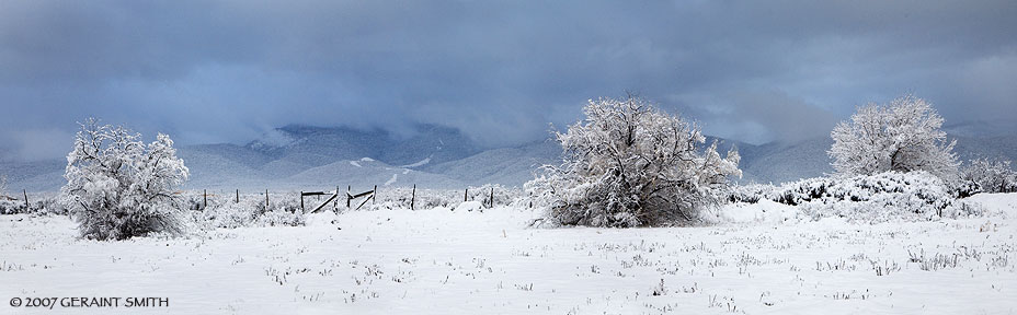 A pastoral winter scene in Taos yesterday ... and a view of the foothills with a break in the storm