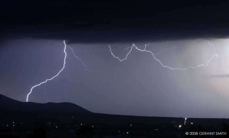 Lightning strike pver the foothills heading south of Taos, NM