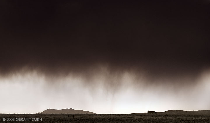 Walking rain over the mesa north of Taos, NM