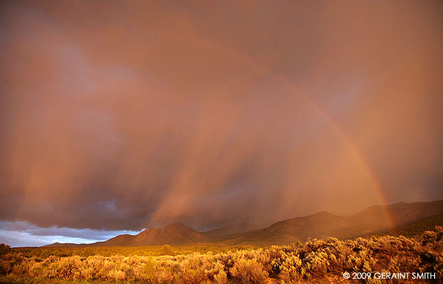 Rainbow over the foothills on a drive south of Taos