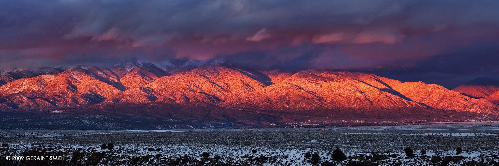 Sangre de Cristos living up to their name, a view from the Rio Grande Gorge rim Taos, New Mexico