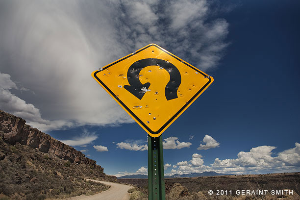 Road sign in the Rio Grande Gorge ... with bullet holes for a real southwest experience!