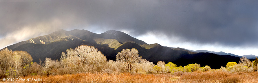 Clearing storm over Taos Mountain