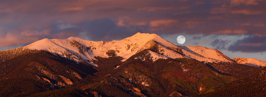 Taos moonrise over Vallecito Peak