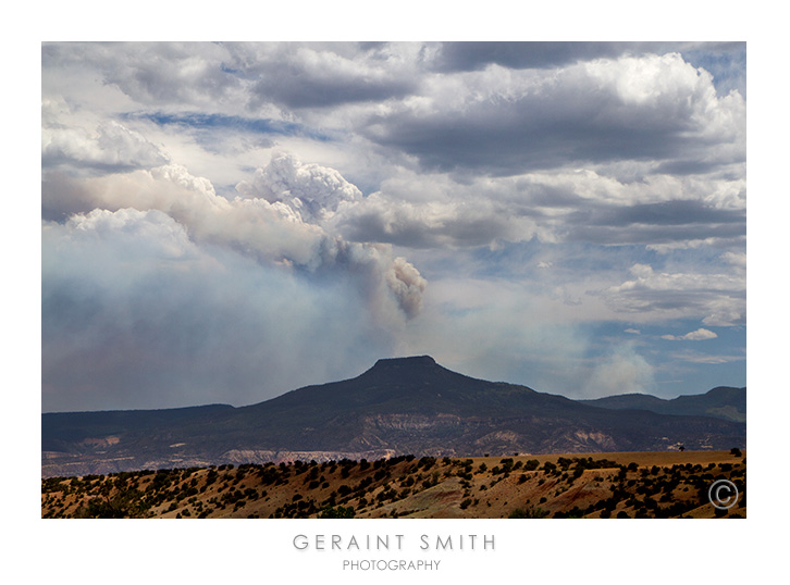 Smoke from the Thompson Ridge fire near Jemez Springs and Cerro Pedernal resembling a volcano