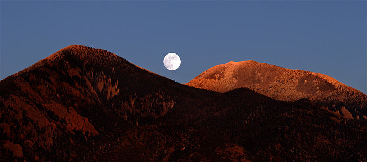 This months full moon rise over Taos mountain, Taos NM