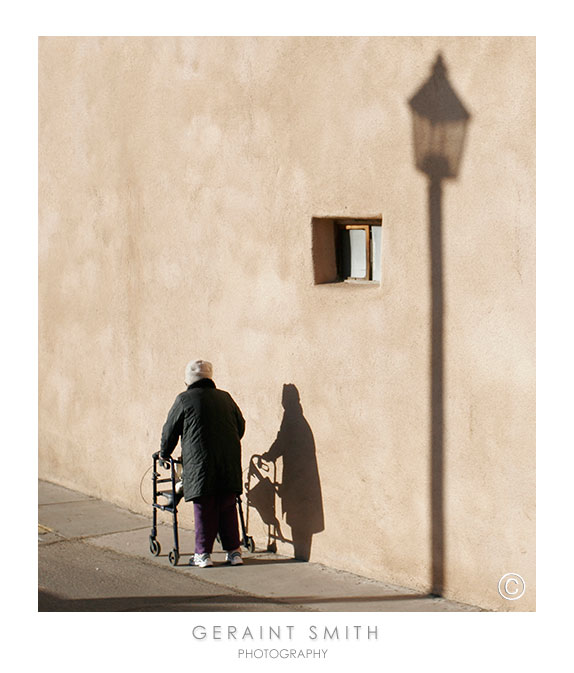 Walking woman just off Taos Plaza