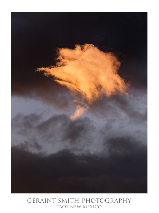 A lone cloud the last to leave the spotlight