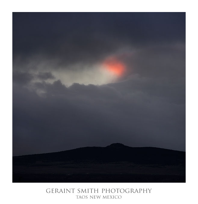 Small red cloud over Two Peaks