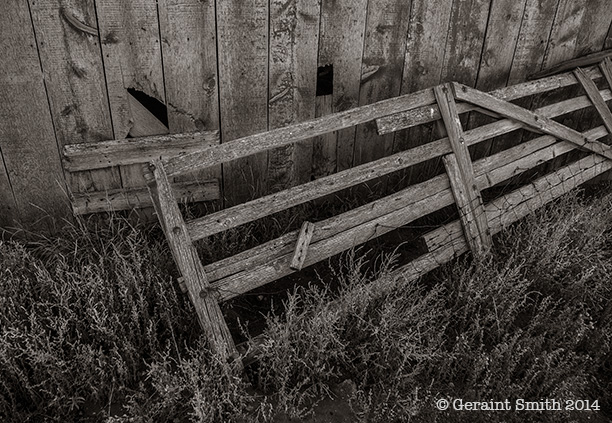 On the road in Colorado barn gate abandoned