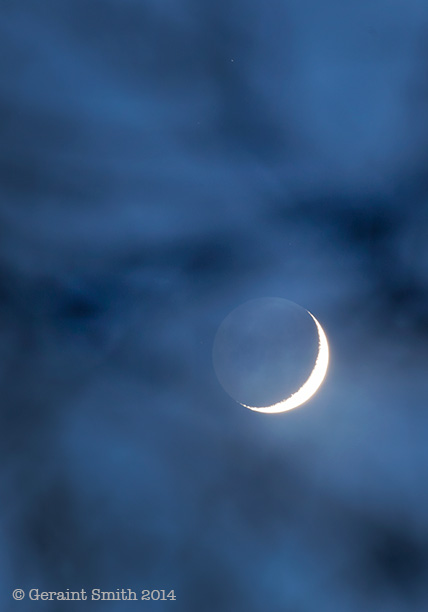 Through the trees off the deck last evening crescent moon trees taos san cristobal nm new mexico