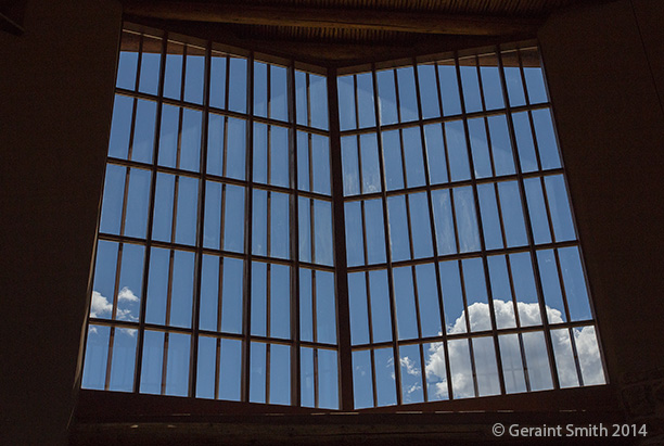 A window like an open book abiquiu monastery christ in the desert dessert clouds nm new mexico