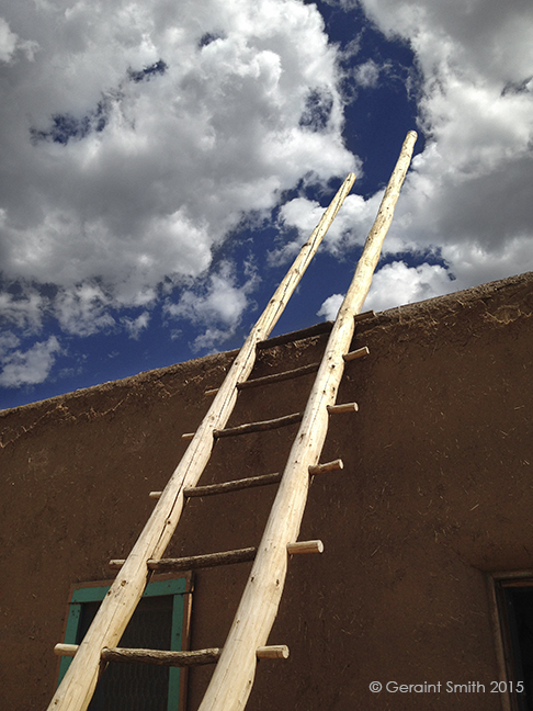In to the clouds adobe laddertaos pueblo new mexico