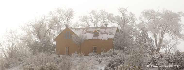 adobe in snow blue windiow trim On the road to El Rito, NM