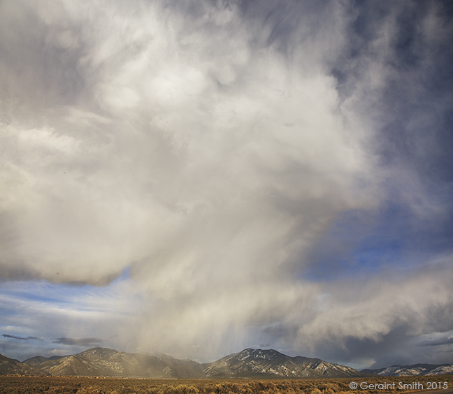 Continuing afternoon storms over Taos, NM taos mountains