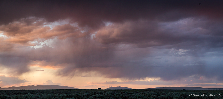 Little home on the mesa under a brooding sky