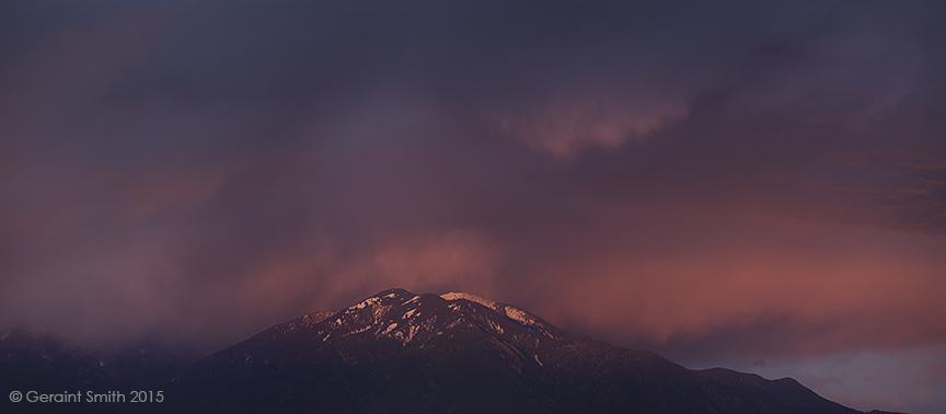 Taos Mountain new mexico storm over mountain clouds