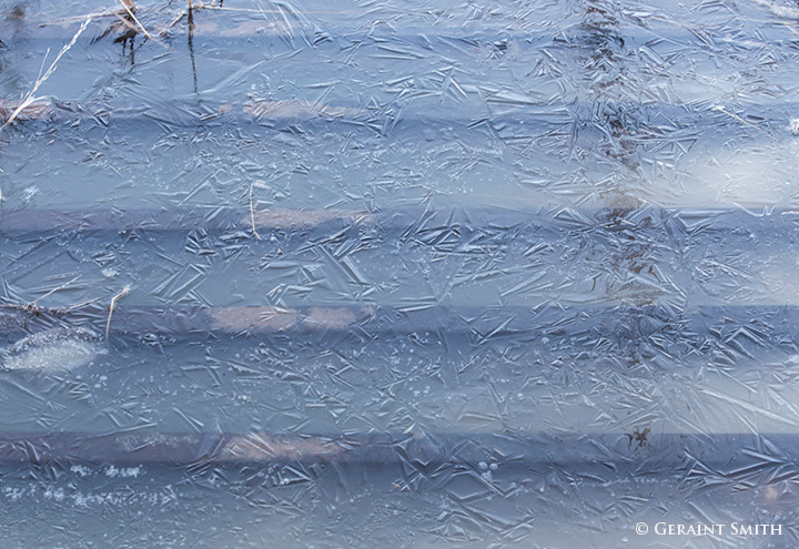 Snow melt all day, floods the cattle guard, freezes up at night for a morning photo op!