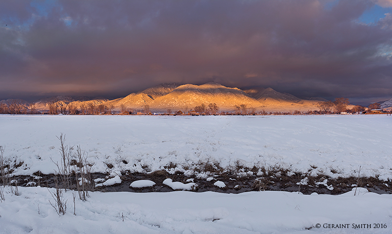 Last light on Taos Mountain pueblo peak