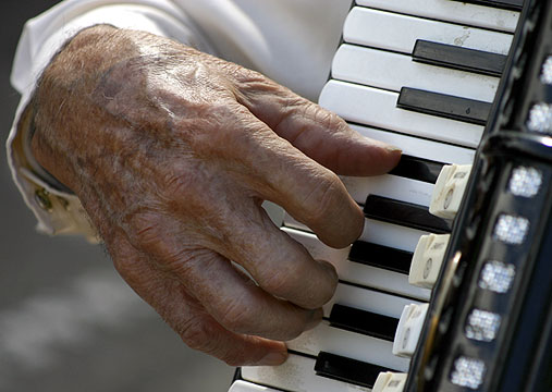 Music of time ... musician at the Taos Farmers Market