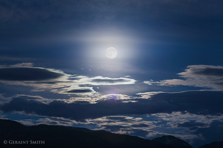 The Sturgeon moon rises over San Cristobal, New Mexico