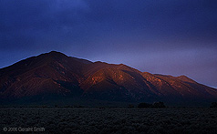 2006 August 13 Taos Mountain with a brief glimmer of sunlight before sunset