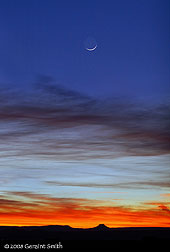2008 February 10, Crescent moon across the mesa over Cerro Pedernal