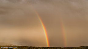 2015 July 29: A very large panorama of the simple end of a rainbow, this evening in San Cristobal, NM