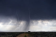 2006 July 03 Lightning strikes and walking rain on the mesa in Taos, NM