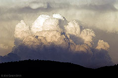2006 June 27 A cloud over the Sangre de Cristo foothills, Taos, New Mexico