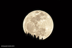 2015 March 06: Last nights full moon rising over San Cristobal, NM
