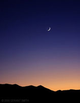 A crescent moon over Taos, New Mexico