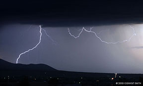 2008 October 06, Lightning strike pver the foothills heading south of Taos, NM